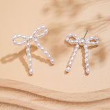 BOW FRENCH TASSEL PEARL EARRINGS_CWAJE1156