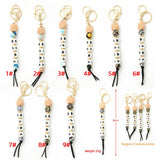 SILICONE BEAD KEYCHAIN WITH LETTER AND WOODEN DISC_CWAB5106
