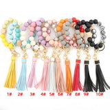 PRINTED WOOD BEAD BRACELET KEYCHAIN WITH TASSEL_CWMM7025