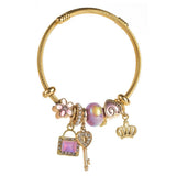 ADJUSTABLE GOLD BRACELET WITH CROWN KEY HEART_CWMM8565