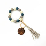LEOPARD WOOD BEAD BRACELET WITH TASSEL KEYCHAIN_CWAB5013