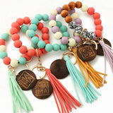 LEOPARD WOOD BEAD BRACELET WITH TASSEL KEYCHAIN_CWAB5013