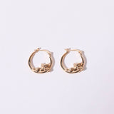 SWEET CUPID PEARL BOW COMPASS DANGLE EARRINGS_CWAJE5107