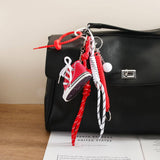 MINI CANVAS SNEAKER CHARM SPORTY GOLF STYLE_CWMM7552