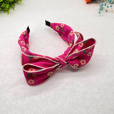 PRESSED WIDE BRIMMED FLORAL BOW HEADBAND_CWAHA2573