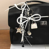 LEOPARD STAR MINI BAG CHARM WITH HEART BOW_CWMM7562