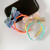 CHILDRENS POLKA DOT BOW HEADBAND_CWAHA1856