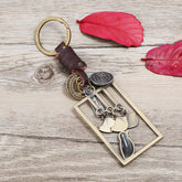 ALLOY BIRD PENDANT WOVEN LEATHER KEYCHAIN_CWMM5038
