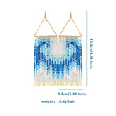 RESORT STYLE BEADED WAVY TASSEL PEARL EARRINGS_CWAJE1652