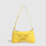 GLOSSY BOW STUDDED DRAWSTRING SHOULDER BAG_CWAB5704