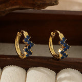 STAINLESS STEEL FLOWER EARRINGS WITH DIAMONDS_CWMM3598