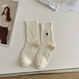 EMBROIDERED MID CALF VERTICAL KNITTED PILE SOCKS_CWMS0944