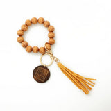 LEOPARD WOOD BEAD BRACELET WITH TASSEL KEYCHAIN_CWAB5107