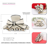 ACETATE DOUBLE SIDED BOW CLIP SHARK CLIP_CWAHA4238