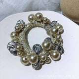 BEADED HAIR TIE WITH METAL PENDANT PEARL BAND_CWAHA6876