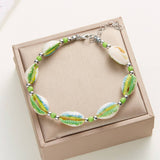 HAND WOVEN BEACH COLORED SHELL RICE BEAD BRACELET_CWAJE2426