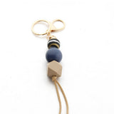 LEOPARD WOOD BEAD KEYCHAIN WITH MINI TASSEL_CWMM7022