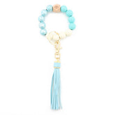 PRINTED WOOD BEAD BRACELET KEYCHAIN WITH TASSEL_CWMM7025