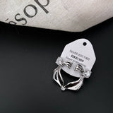 TEXTURE RIBBONS EARRINGS STUDS AND EARRINGS_CWAJE2023