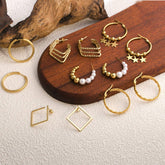 CIRCLE STAINLESS STEEL TWISTED DIAMOND EARRINGS_CWMM3612