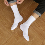 SOLID COLOR MASSAGE BOTTOM CASUAL MID CALF SOCKS_CWMS0993