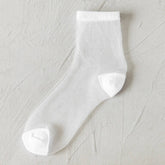 BLACK AND WHITE JACQUARD TRANSPARENT MID TUBE SOCKS_CWMS0414