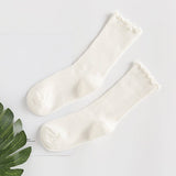 SOLID COLOR RUFFLED LONG SOCKS_CWMS0977
