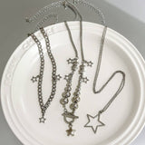 BEADED NECKLACE WITH STAR SHAPED PENDANT TASSELS_CWAJE1158