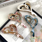 SWEET AND VERSATILE HEART HOLLOW HAIRPIN_CWAHA2641