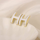 NEW SIMPLE HOLLOW GRID FOUR LEAF EARRINGS_CWAJE3985