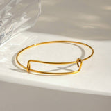 CLASSIC ADJUSTABLE 18K GOLD PLATED STEEL BANGLE_CWAJE4884