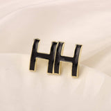 NEW SIMPLE HOLLOW GRID FOUR LEAF EARRINGS_CWAJE3985