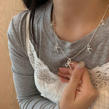 Womens Temperament Metal Bow Tassel Necklace