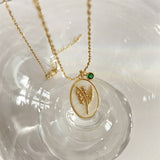 DECEMBER THREE DIMENSIONAL FLORAL OVAL NECKLACE_CWAJE1614