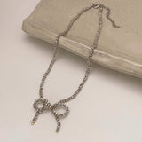 Wear High-End Metal Round Bead Bow Necklace