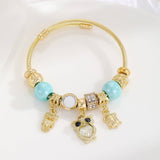 GOLD STAINLESS STEEL DOLPHIN TAIL BRACELET_CWMM8490