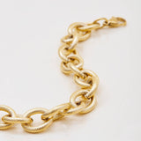 THICK RIBBED CROSS CHAIN BRACELET 18K GOLD STEEL_CWAJE4809
