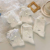 BOW LACE THIN MID LENGTH SOCKS_CWMS0451