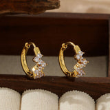 STAINLESS STEEL FLOWER EARRINGS WITH DIAMONDS_CWMM3598