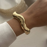 IRREGULAR METAL SMOOTH SPRING WIDE BRACELET_CWMM3110