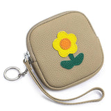 LEATHER SUNFLOWER WRISTLET MINI COIN POUCH_CUAB00399