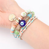 BOHEMIAN MULTI LAYERED EVIL EYE BRACELET_CWAJE2214