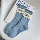 STRIPED COLOR BLOCK LETTERING SPORTS SOCKS_CWMS0964