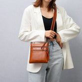 SOFT LEATHER VERTICAL ZIPPER SHOULDER BAG_CUAB0033