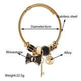 GOLD CRYSTAL BOW CHARM BRACELET FOR WOMEN_CWMM8471