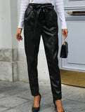 Black high-waisted lantern pants with bow