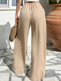 Cross-pleated high-waisted loose-fitting trousers