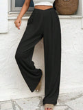 Cross-pleated high-waisted loose-fitting trousers