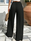 Cross-pleated high-waisted loose-fitting trousers