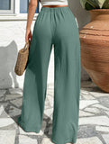 Cross-pleated high-waisted loose-fitting trousers